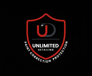Edit the existing Unlimited Detailing logo so the complete image has a solid black background, including the entire interior of the shield and the area outside it. Keep the shield border vivid red, keep the U mark red, and keep every word and lettering element clean white. Preserve the shield shape, proportions, and remaining logo details. Keep the horizontal line removed. Do not use transparency or white fill anywhere; the background must be solid black.